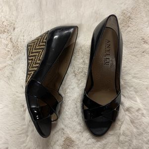 Anyi Lu Patent Leather crisscross peep toe wedges
